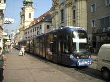 Landstr zw Mozartkreuzung und Harrachstr, im Hintergrund Ursulinenkirche